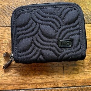 Lug Splits Compact Wallet in black. Double zipper.